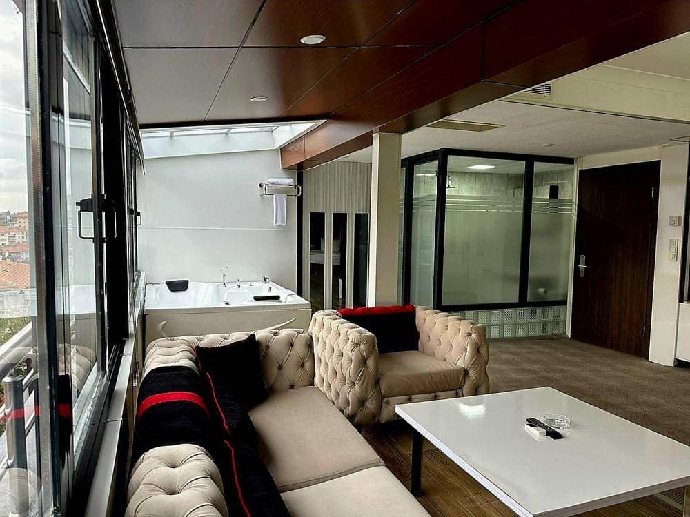 Foto 10 von 28: Deluxe Suite with Spa Bath