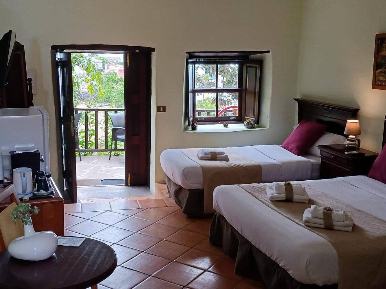 Foto 6 von 20: Twin Room with Private Bathroom