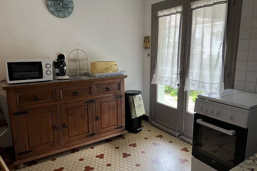 Foto 9 von 14: Small apartment with garden