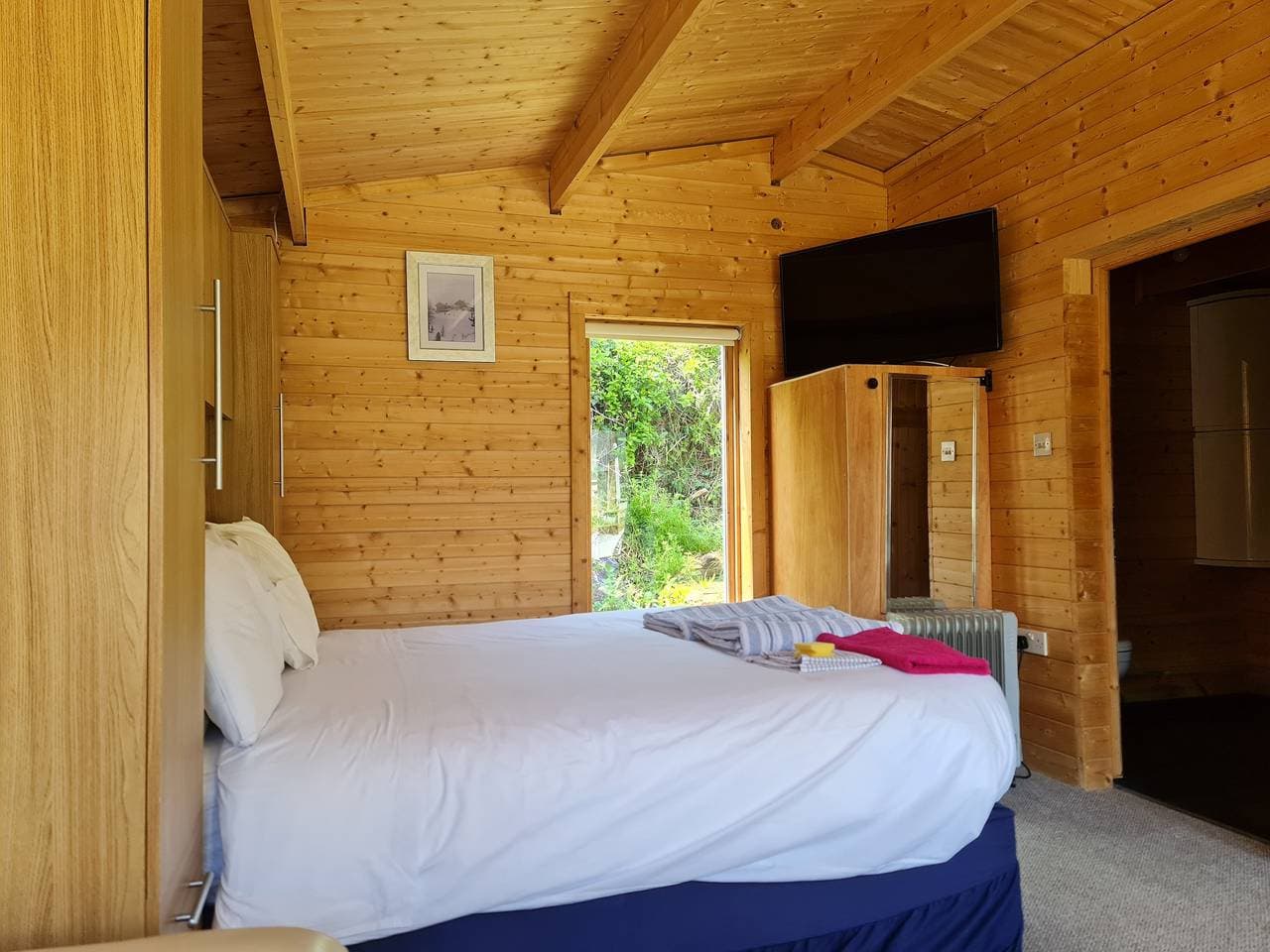 Foto 7 von 19: Blockhütte für 2 Personen mit Garten