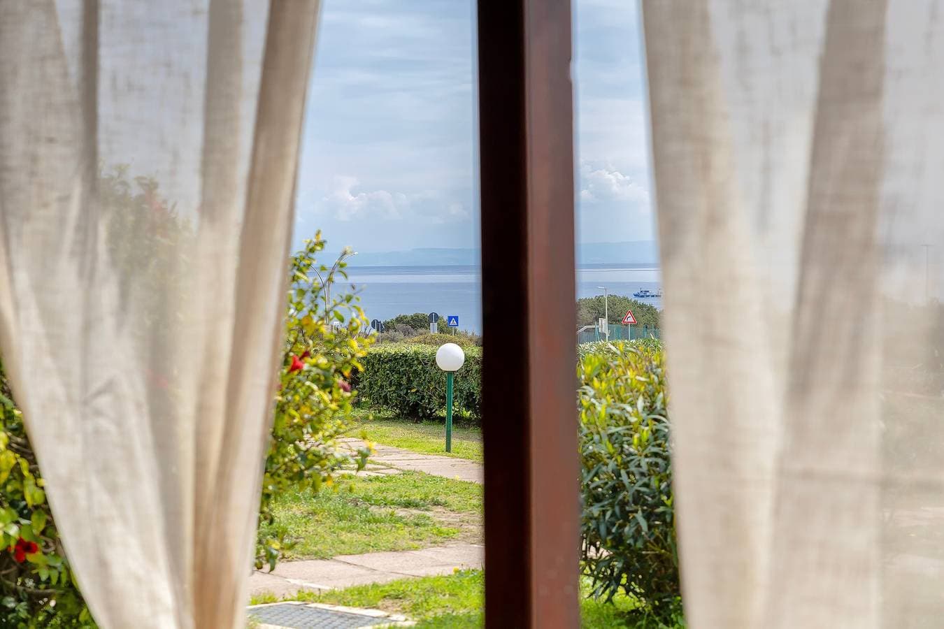 Foto 3 von 33: Ferienhaus 'Fiamma' mit Meerblick, privater Terrasse und Klimaanlage