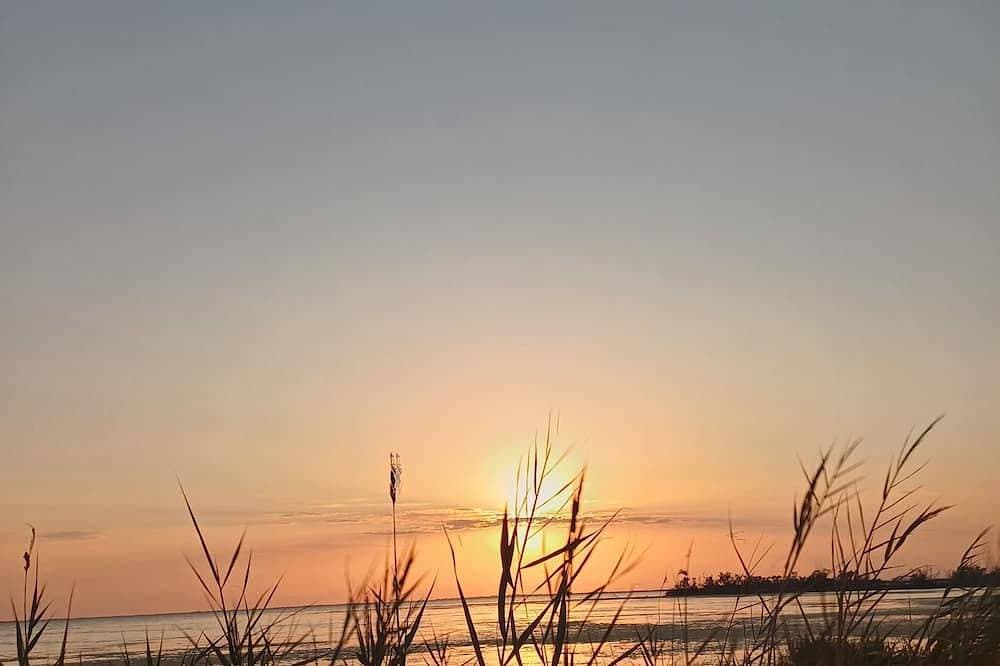 Foto 9 von 11: \"An Endless Summer\"! Apartment with a courtyard, a 5-minute walk from the ocean.