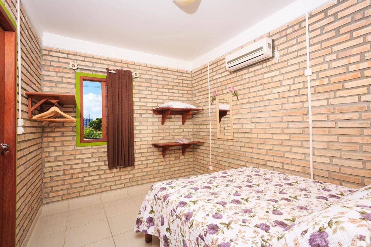 Foto 5 von 19: Economy Room with Shared Bathroom