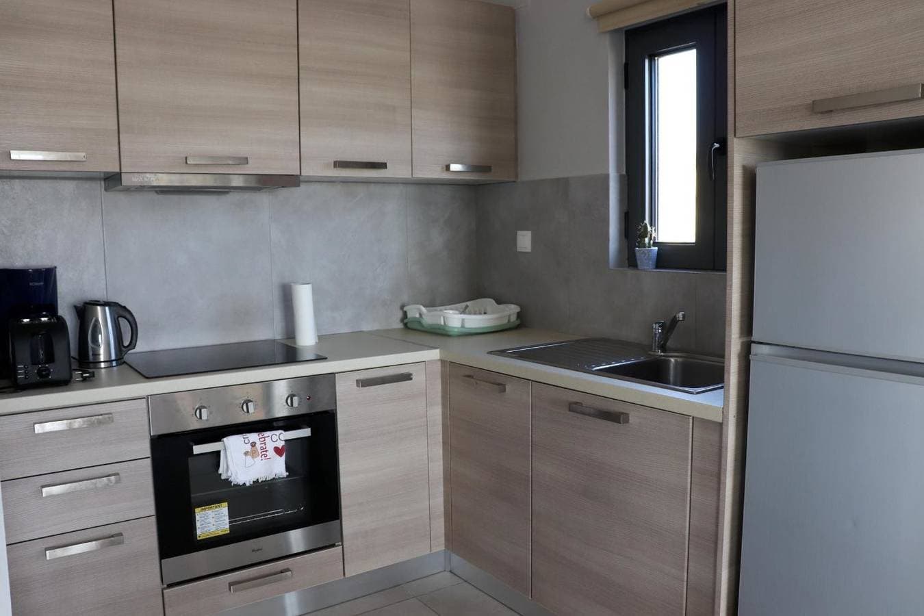 Foto 11 von 38: Weiter Blick auf Landschaft und Meer, Pool, 4 Pers. | Ferienhaus Triopetra, Kreta