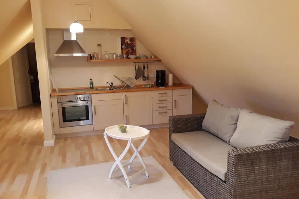 Foto 8 von 11: Cozy living under thatch