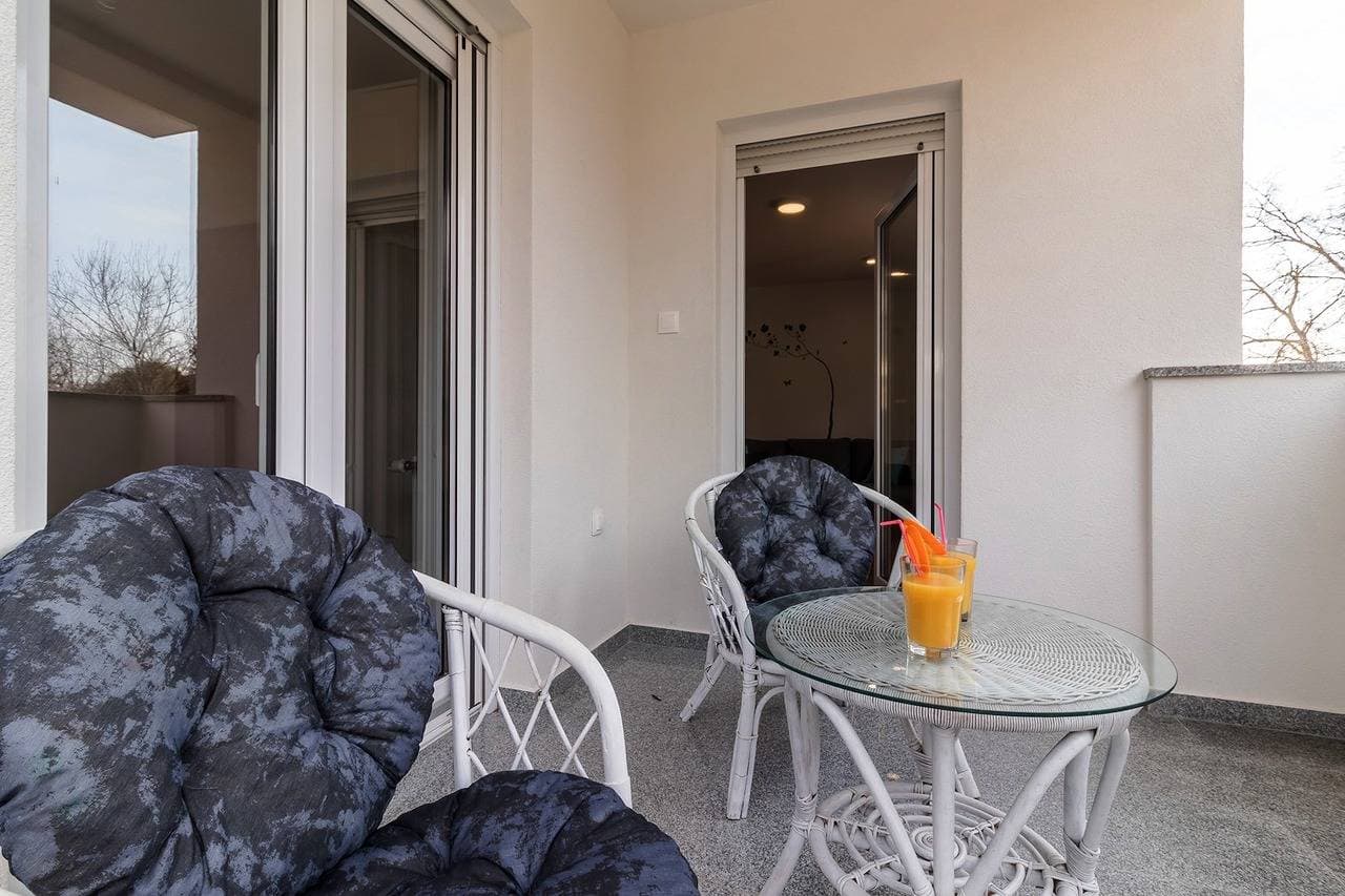 Foto 8 von 14: Comfortable lovely apartment with patio and grill / A2