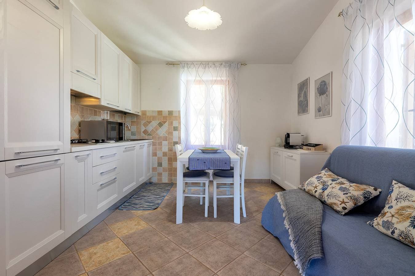 Foto 5 von 27: Ferienhaus 'Casa Con Terrazza' mit privater Terrasse, Wi-Fi und Klimaanlage