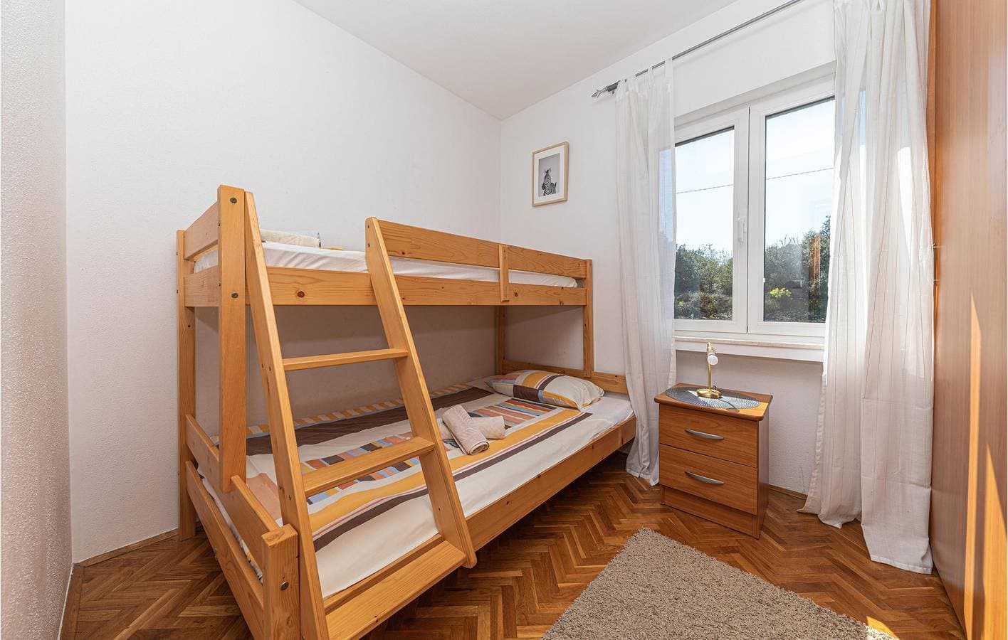 Foto 8 von 19: Apartment mit Meerblick, Pool und Terrasse, 700 m vom Strand entfernt
