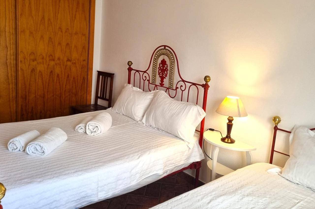Foto 4 von 16: Standard Double Room with Shared Bathroom