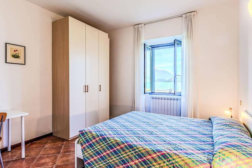 Foto 4 von 28: Vecchia Filanda Apartment 302