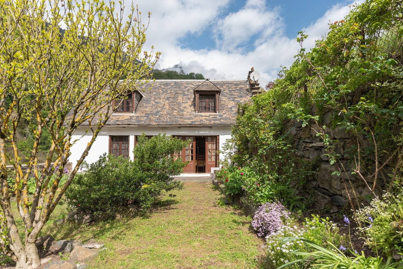 Foto 3 von 20: Ferienhaus 'Cottage Au Calme' mit Bergblick, privater Terrasse und privatem Garten