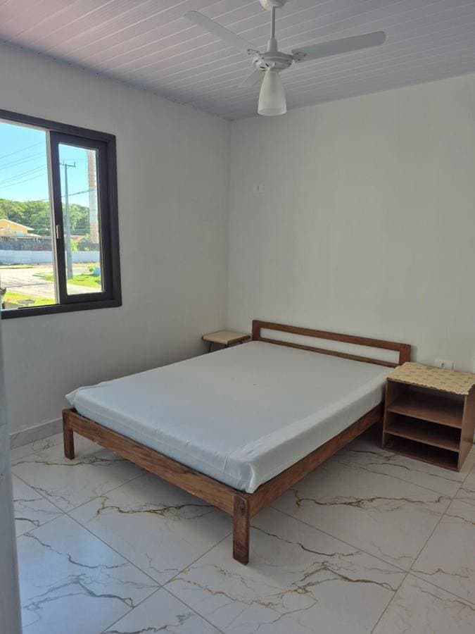 Foto 4 von 23: Economy Quadruple Room with Shared Bathroom