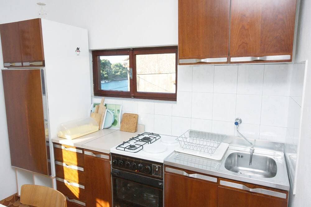 Foto 8 von 13: 2-Zimmer-Ferienwohnung mit Balkon und Meerblick Maslinica, Solta