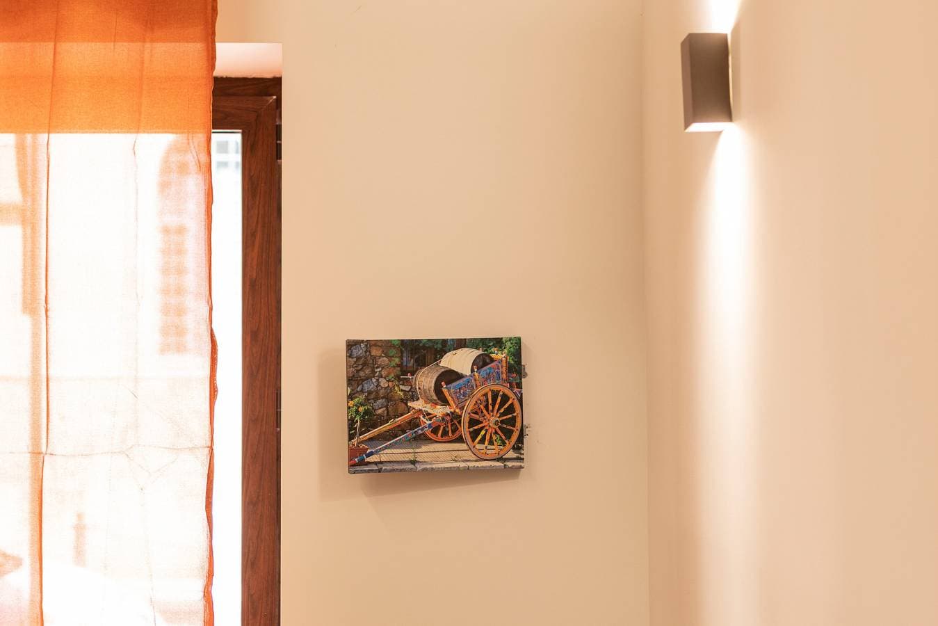 Foto 10 von 34: Ferienwohnung 'La Casetta Del Cuore' mit privatem Hinterhof, WLAN und Klimaanlage