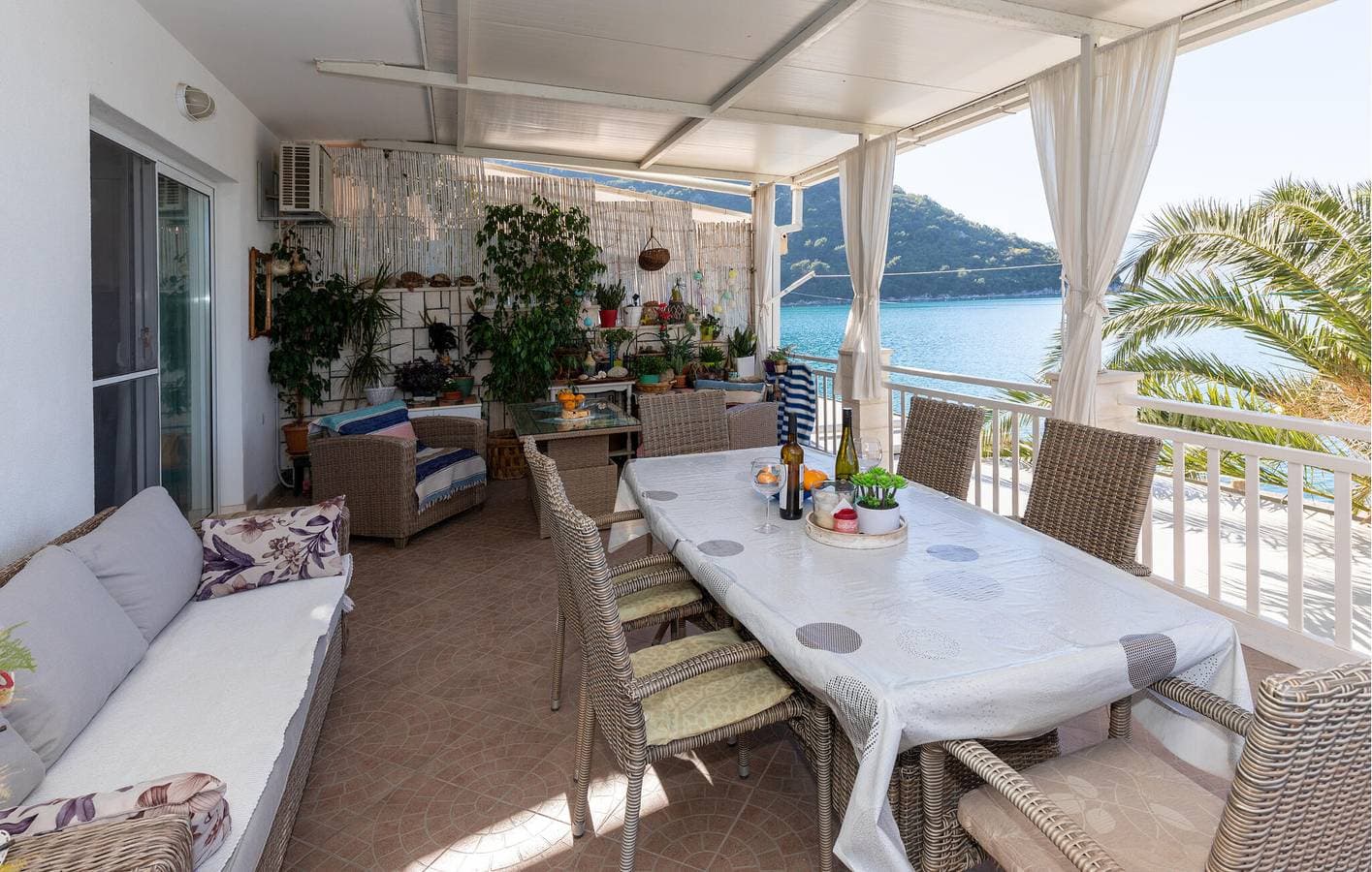 Foto 10 von 38: Gemütliche 300 m zum Strand: Klimatisierte Wohnung mit Terrasse und Parkplatz