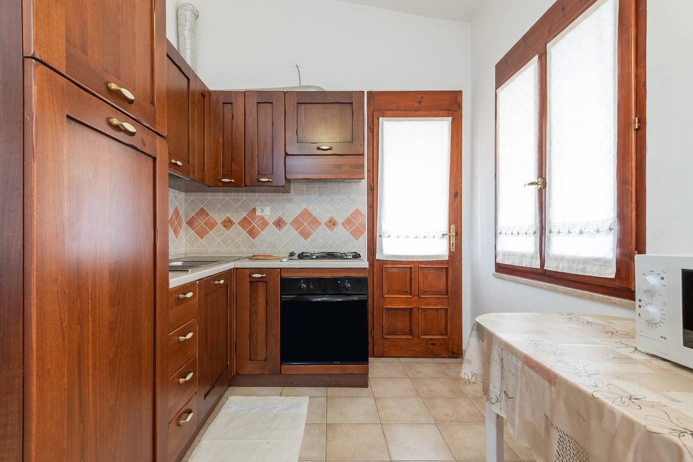 Foto 10 von 29: Ferienhaus "Casa Vacanze dei Pini" mit Terrasse und Gemeinschaftsgarten