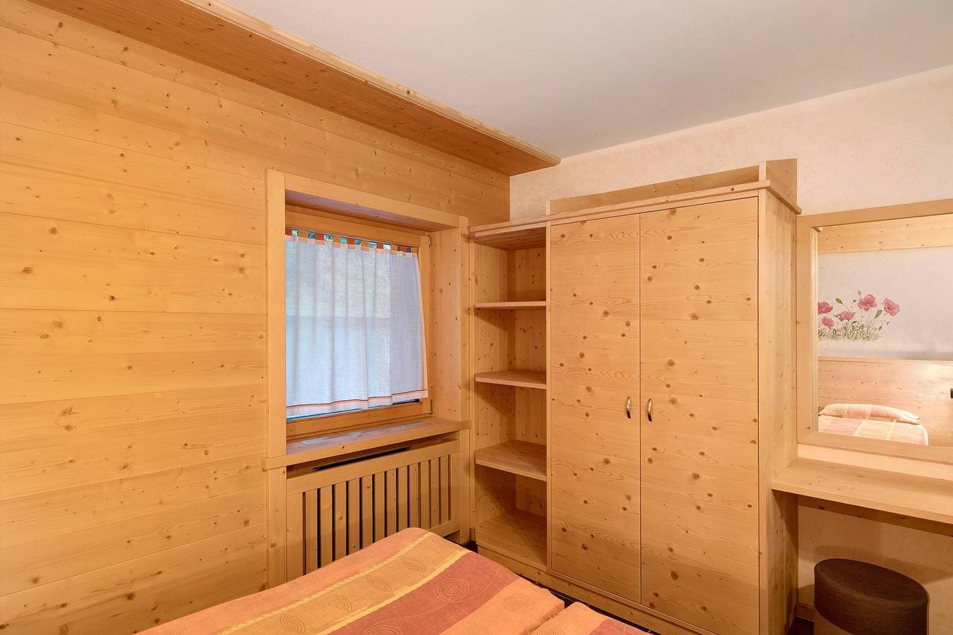 Foto 11 von 21: Ferienwohnung 'Residenz Attila Giardino' mit Bergblick, Gemeinschaftsgarten & WLAN
