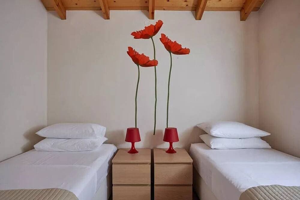 Foto 3 von 9: 2 - Schlafzimmer Residenz mit Blick auf den Garten