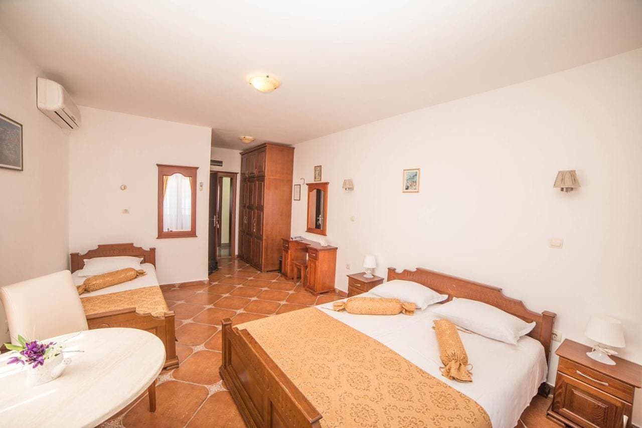 Foto 10 von 12: Quadruple Room with Sea View