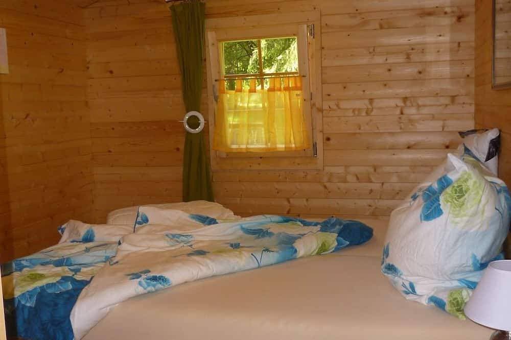 Foto 2 von 19: Holz-Blockhaus für vier Personen mit Terrasse