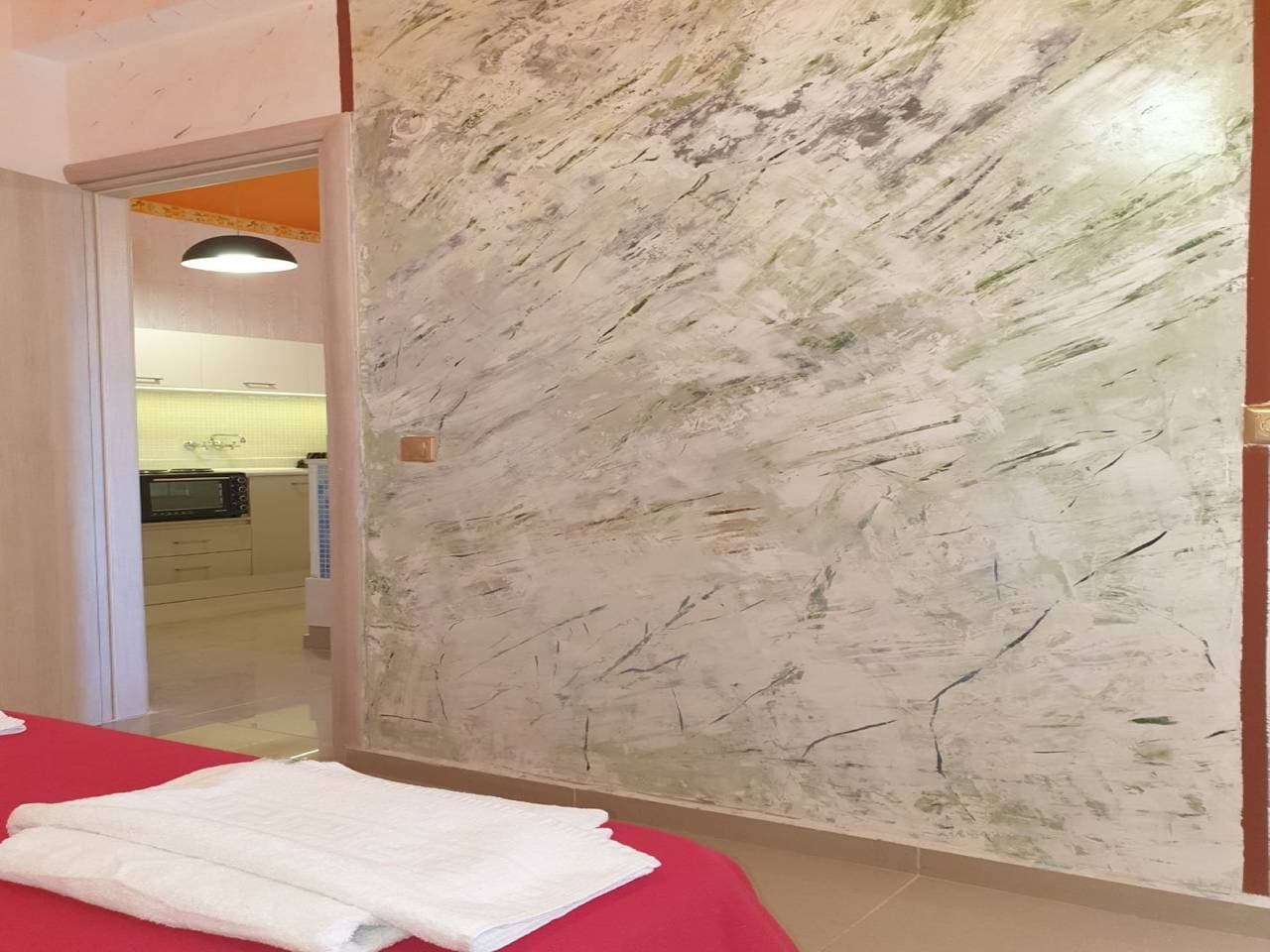 Foto 11 von 21: Ganze private Suite mit Meerblick mit Balkon, Gemeinschaftspool und Klimaanlage