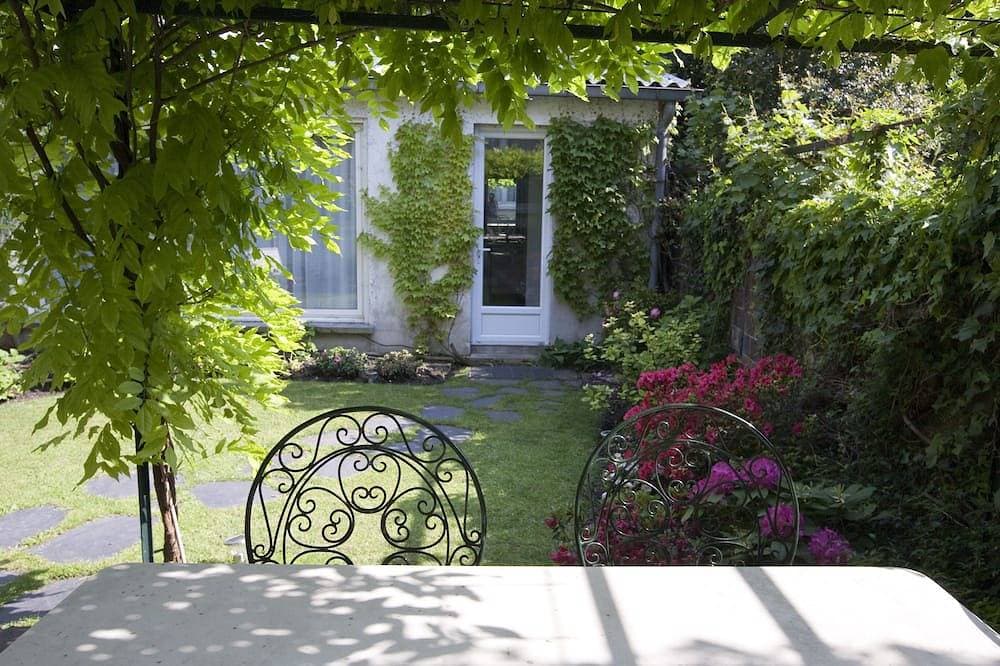 Ein charmantes Gästehaus in einem Garten, 500 m von Paris entfernt 1