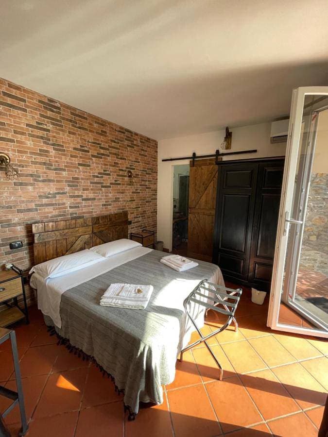 Foto 4 von 13: Deluxe Triple Room