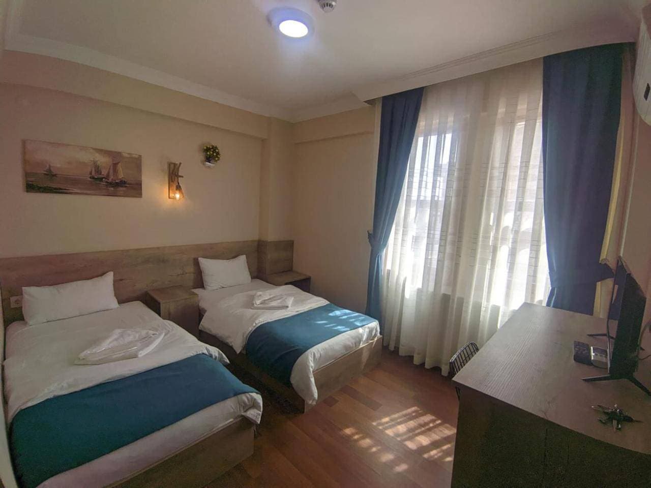 Foto 8 von 19: Deluxe Double Room with Side Sea View