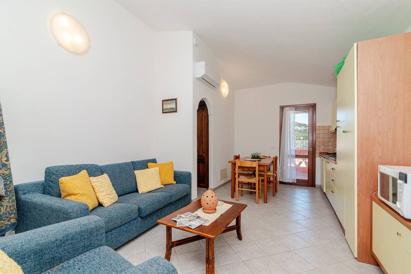 Foto 6 von 20: Villetta Girasole: Apartment mit privater Terrasse, Garten und Klimaanlage