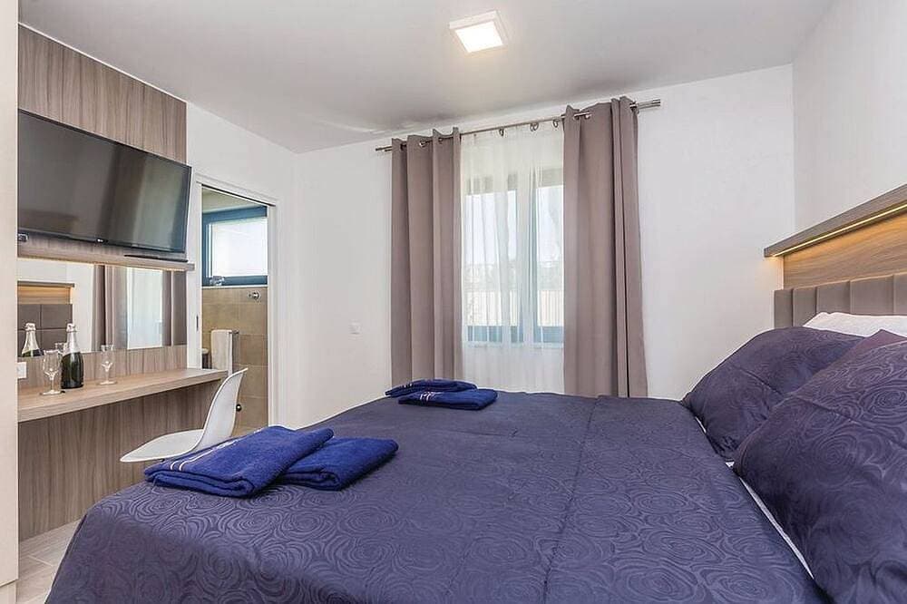 Foto 4 von 30: Ferienwohnung Poseidon 1 Malinska Krk – Pool & Strandnähe
