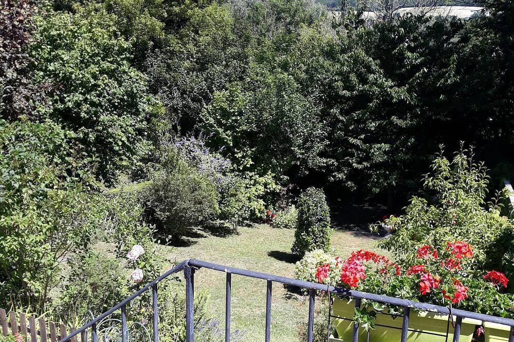 L'escale Arquaise, Das Haus mit einem Blumengarten 1