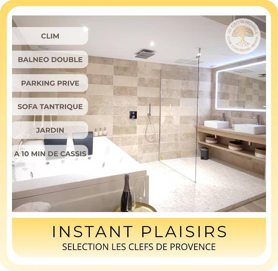 Instant Plaisirs - T2 60m2 avec Terrasse et Balnéo privative 1