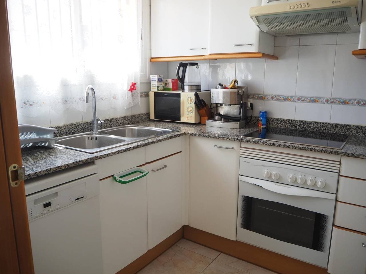 Foto 5 von 21: Casa a l'Estartit, piscina, jardí
