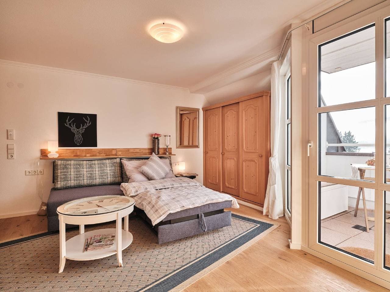 Foto 5 von 13: Einzimmerapartment 'Sunset' mit Seeblick, privater Terrasse und WLAN
