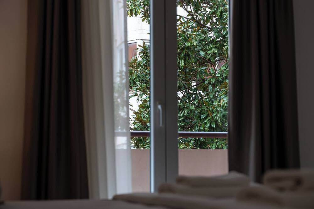 Foto 10 von 12: Cozy Double Room near the Beach