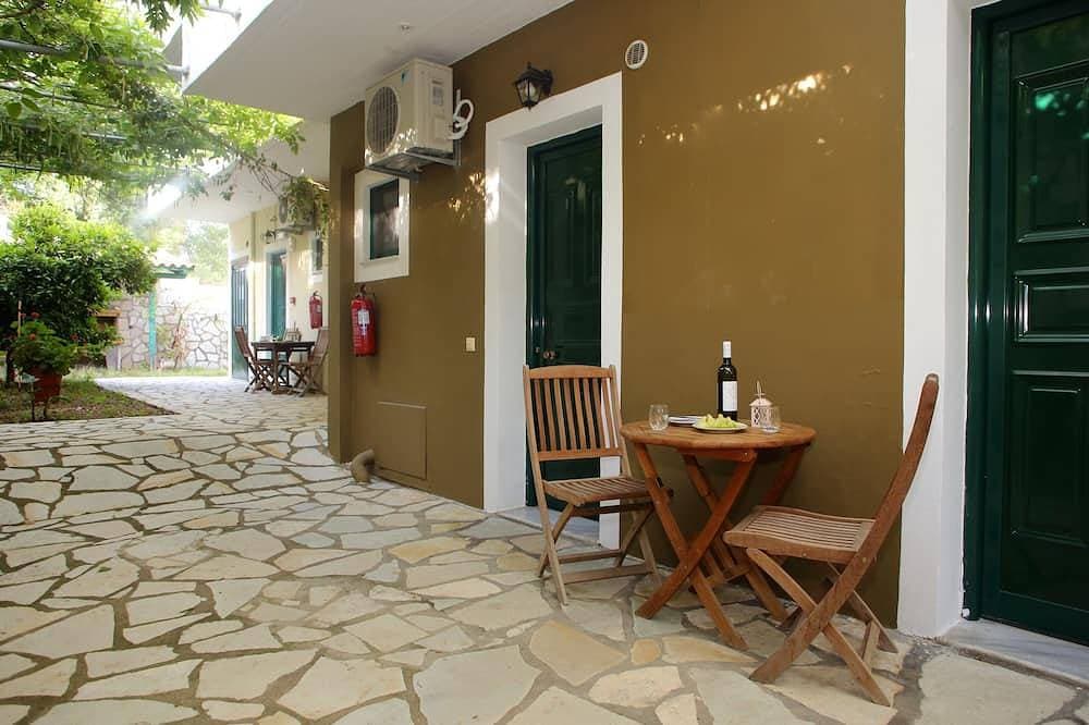 Apartment 'One Bedroom 10' mit Gartenblick, WLAN und Klimaanlage 1