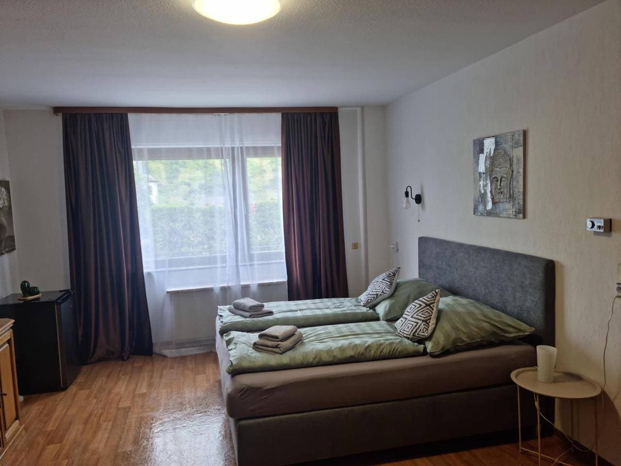 Foto 7 von 10: Double Room with Private Bathroom