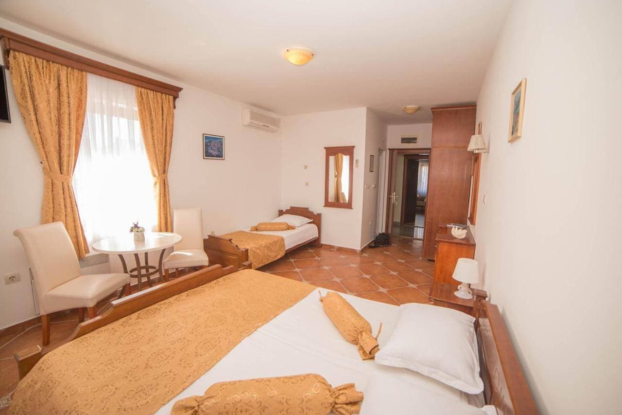 Foto 9 von 12: Quadruple Room with Sea View
