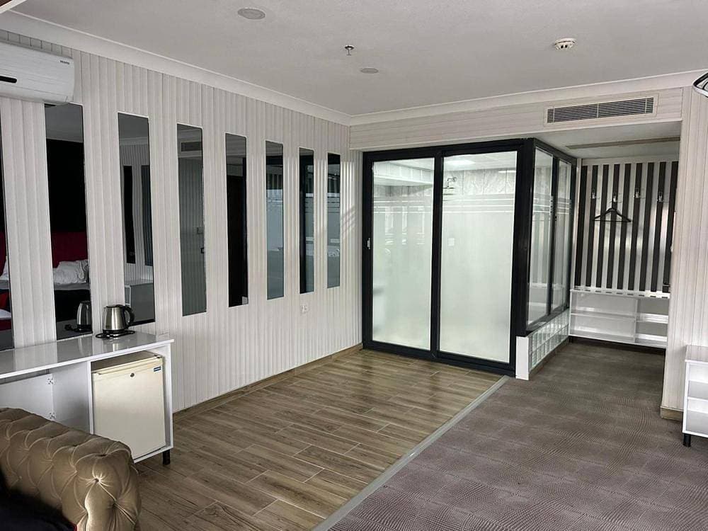 Foto 11 von 28: Deluxe Suite with Spa Bath