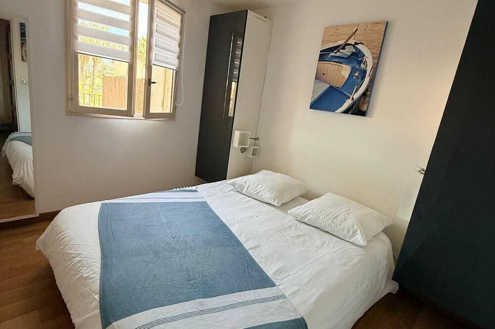 Foto 3 von 25: Apartment mit 2 Schlafzimmern, Swimmingpool und Tiefgarage