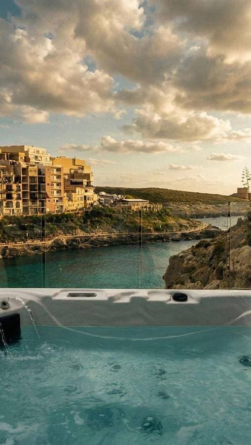 Water's Edge Suite Xlendi Direct Seafront with Private Roof Top Jacuzzi 1