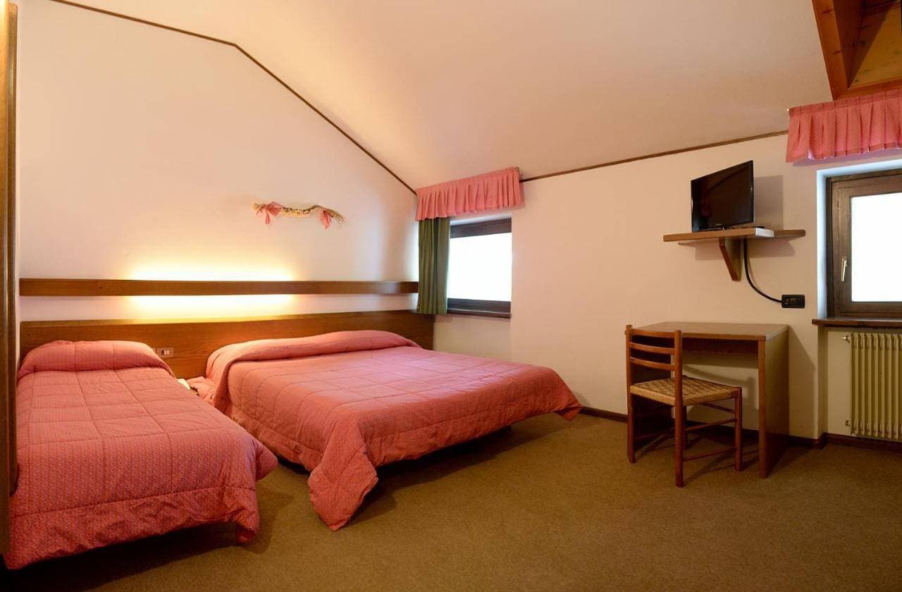 Foto 2 von 9: Triple Room