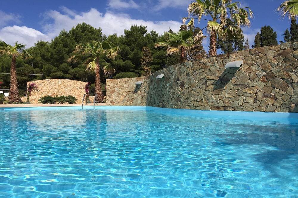 Wohnung mit Garten in Residenz mit Pool 1