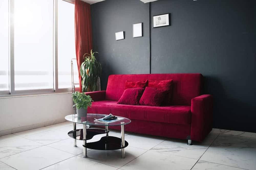 Foto 8 von 19: Cozy Sea View Apt w/ pool access + Netflix