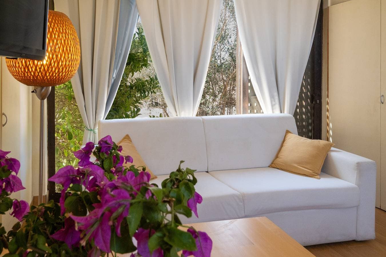 Foto 2 von 20: Appartement 'Residenze Uliveto - Residenza 10' mit Pool, privater Terrasse und Klimaanlage