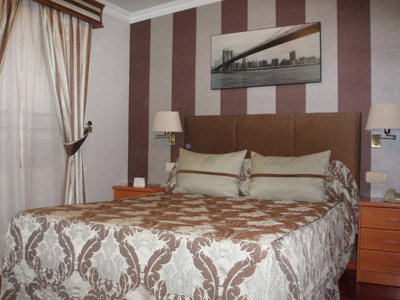 Foto 2 von 10: Triple Room