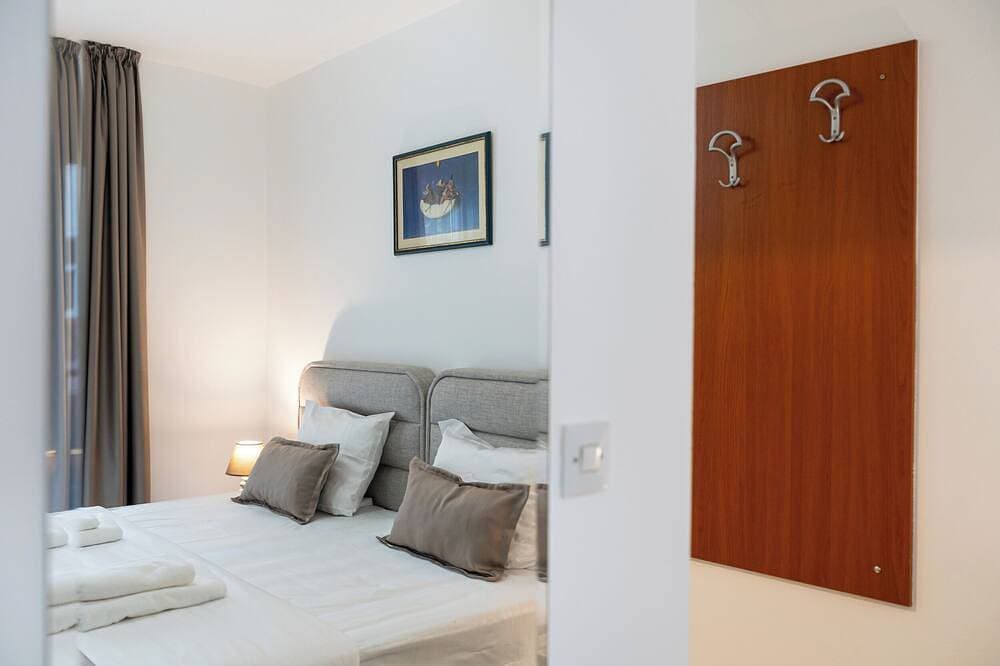 Foto 6 von 12: Cozy Double Room near the Beach