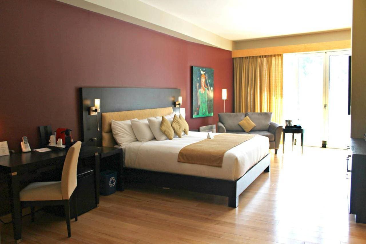 Foto 9 von 12: Superior Room with One King Bed –Eco River Lodge