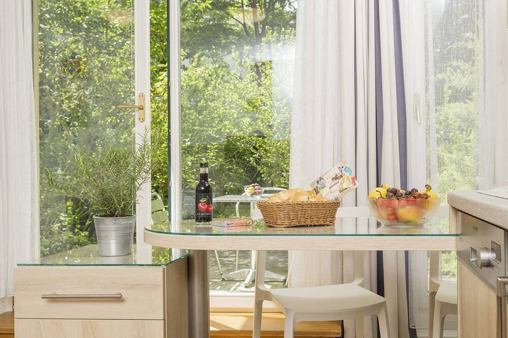 Foto 8 von 12: Apartement Studio mit Garten