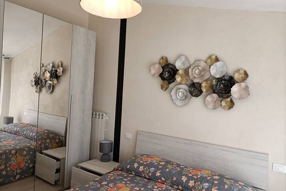 Foto 3 von 12: Il Cedro - double room with garden (no apartment)